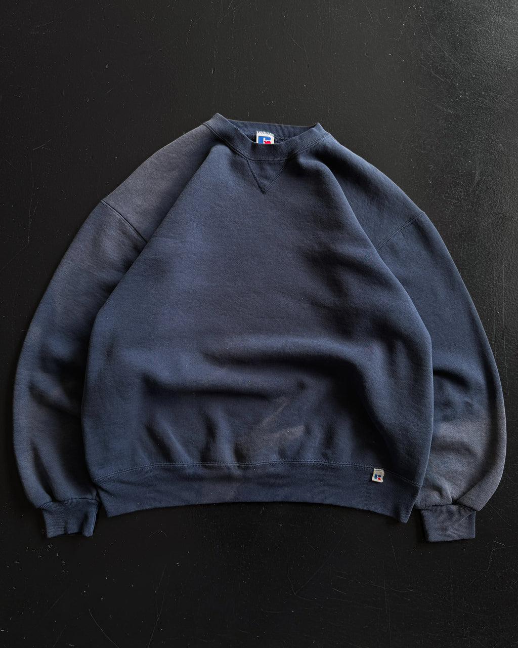 1990S RUSSELL SUN FADED BOXY NAVY SWEATSHIRT