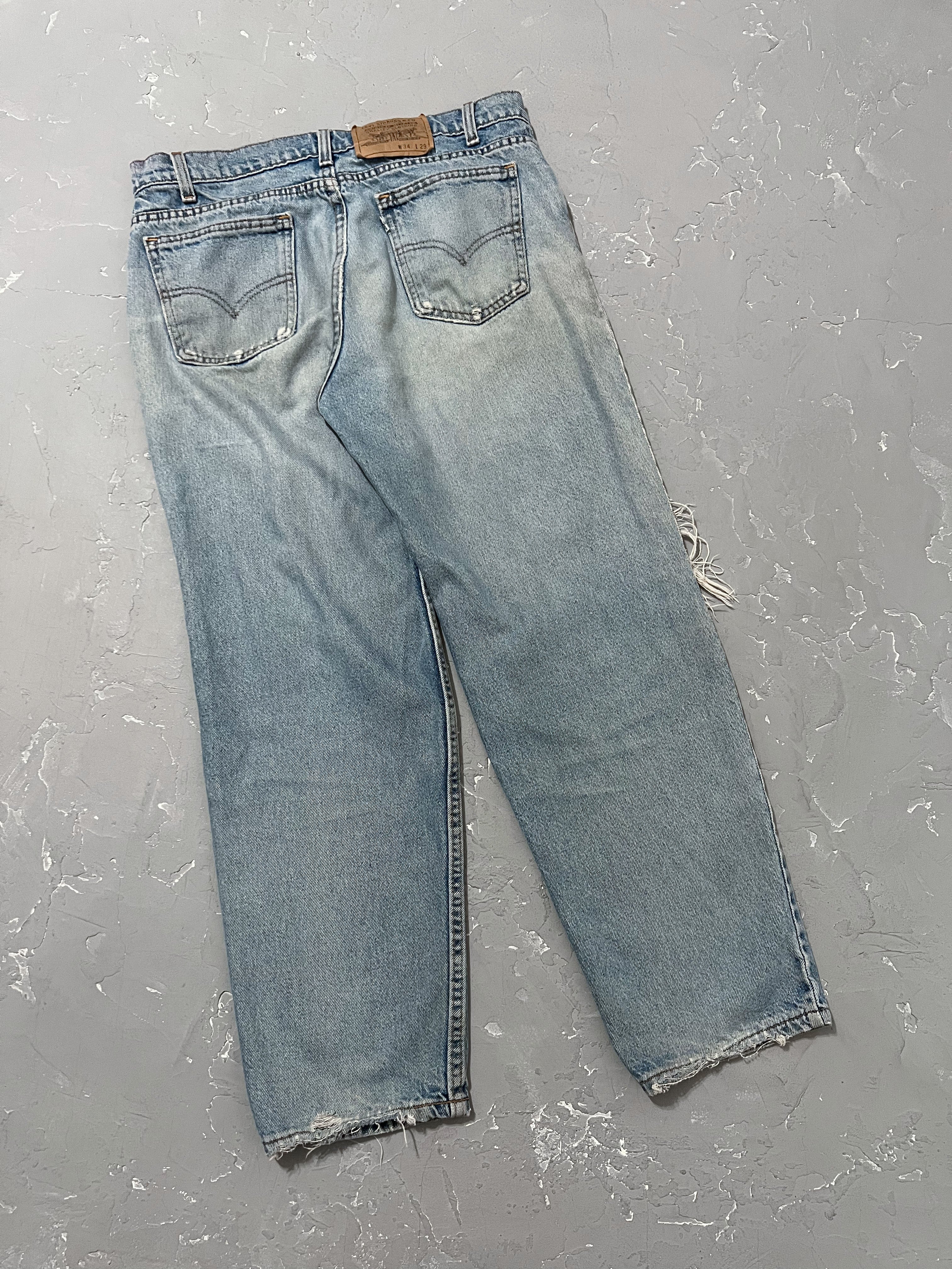 1990s Distressed Levi’s 550 White Tabs [33 x 30]