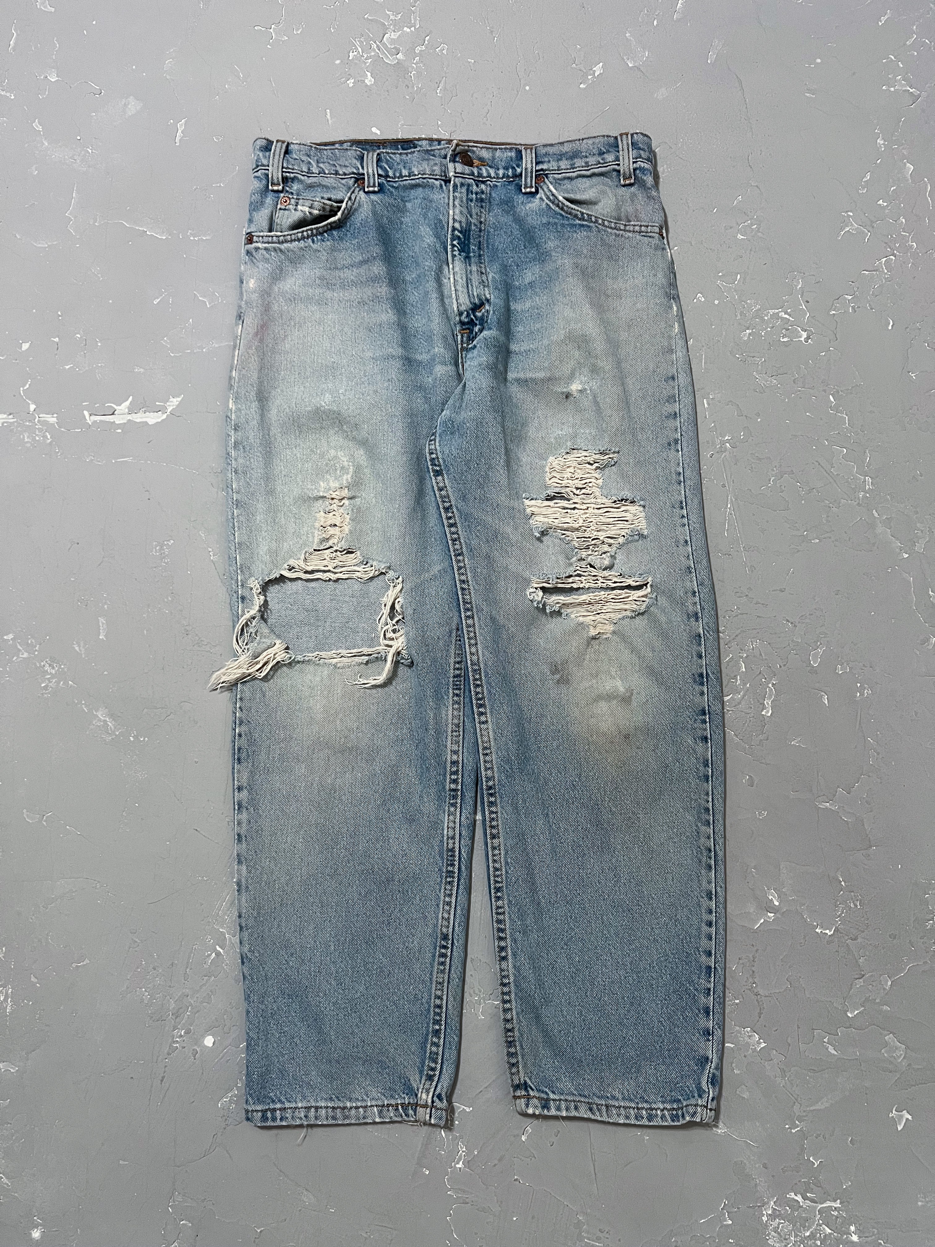 1990s Distressed Levi’s 550 White Tabs [33 x 30]